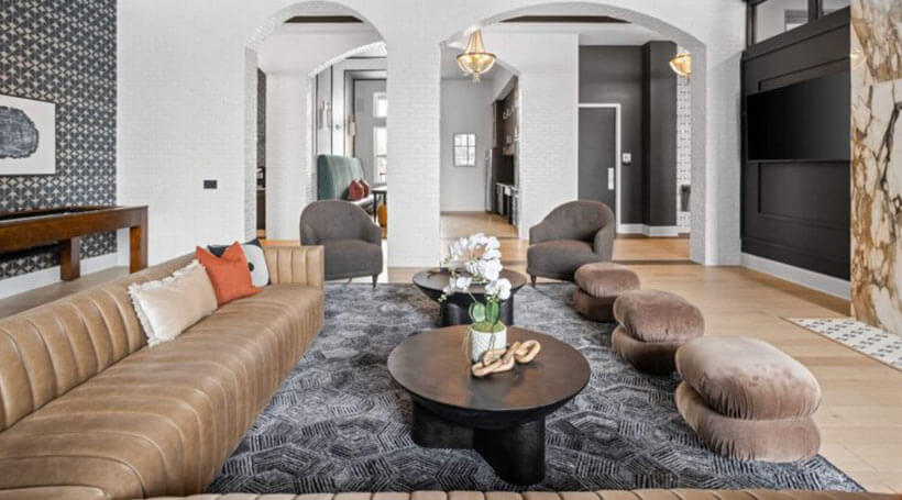 leather sofa in room with fireplace